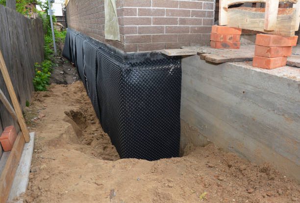 Happy homeowners after waterproofing job in Corryton